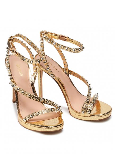 GUESS KAIHA Sandalia alta con tachuelas oro - Zapatos Mujer