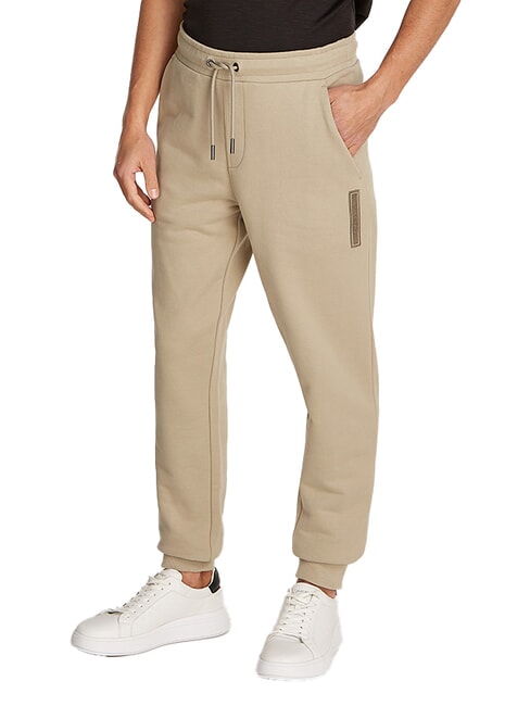 CALVIN KLEIN CK Pantalones de chándal de corte regular arcilla fresca - Trajes deportivos para hombres