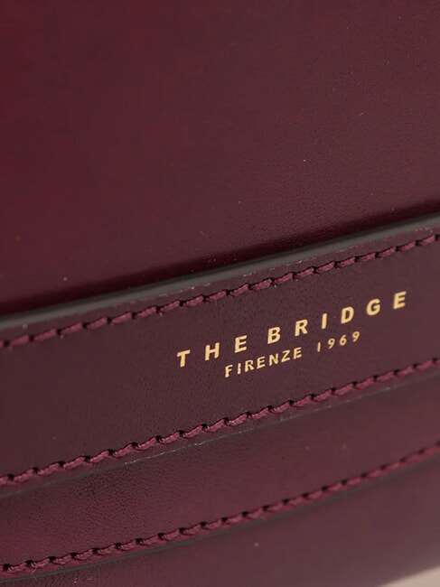 LUCREZIA Bolso clutch con puño de piel uva abad. oro - Bolsos Mujer