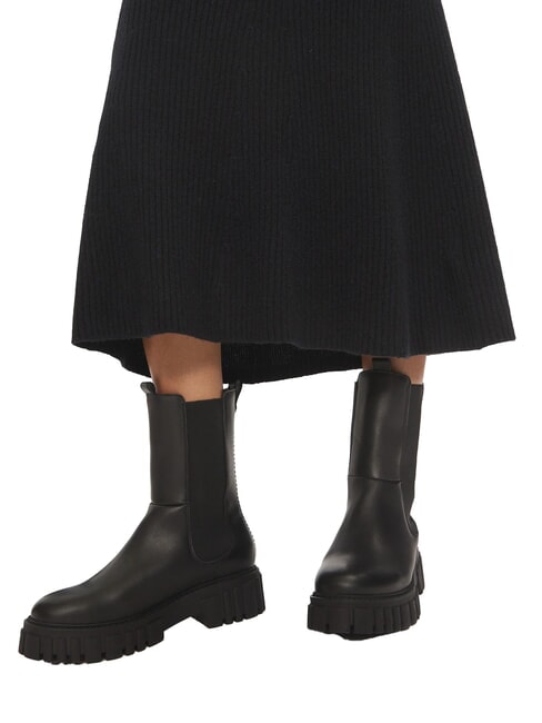 CK Falda midi acampanada de canalé ck negro - Faldas de mujer