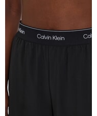 CALVIN KLEIN CK PERFORMANCE Pantal&oacute;n palazzo con el&aacute;stico con logo belleza negra - trajes deportivos para mujeres - 3