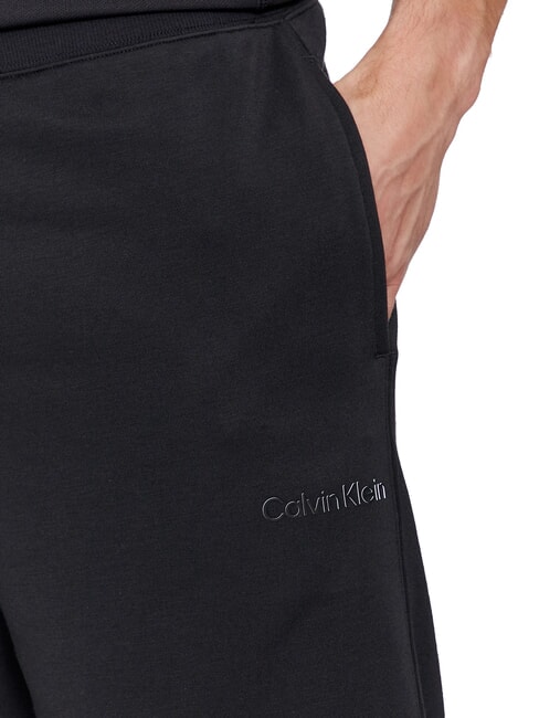 CK PERFORMANCE Pantalones cortos deportivos de corte regular belleza negra - Trajes deportivos para hombres