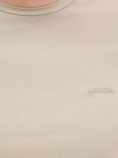CK Camiseta de manga corta elástica y ajustada beige piedra - camiseta