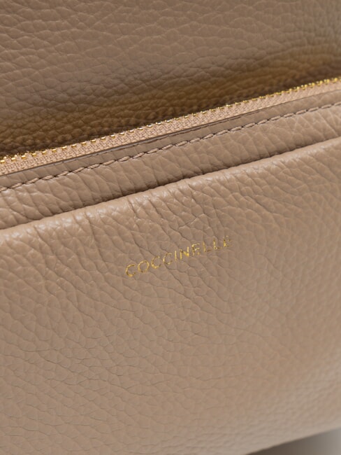 JEN Mochila redonda de piel con bolsillo. topo cálido - Bolsos Mujer